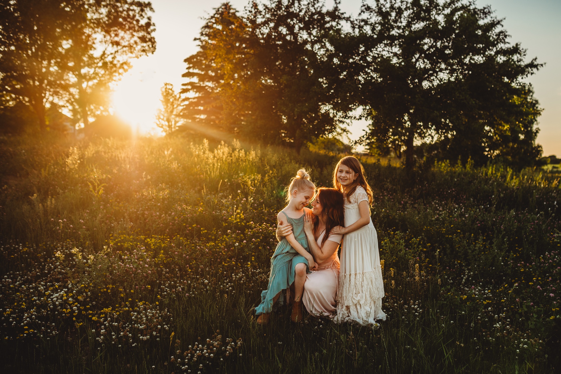 mother-with-daughters-flower-field-
