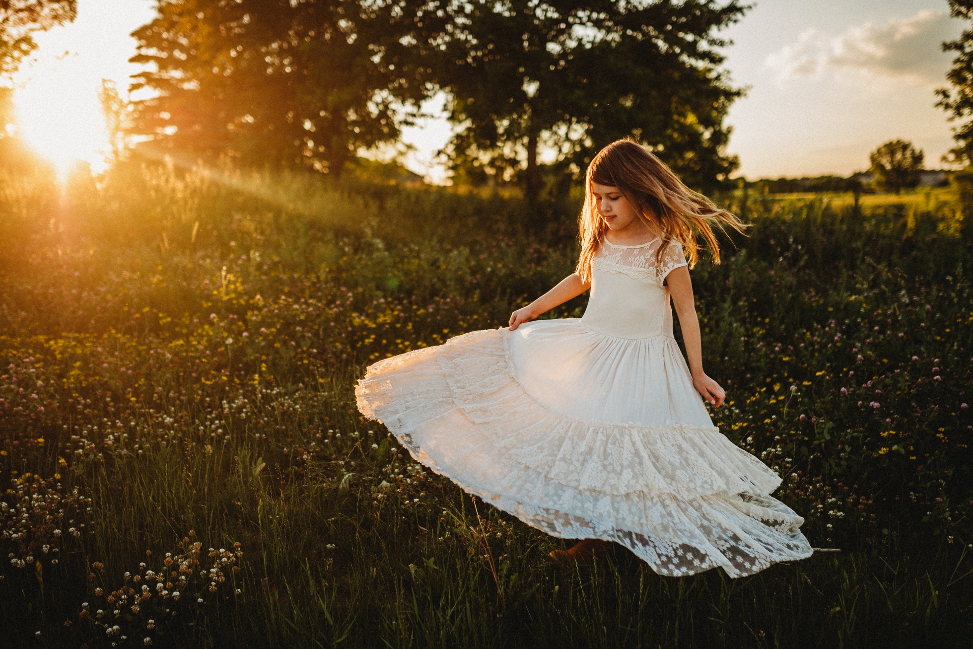 young-girl-white-dress-twirls-light-wayzata-childrens-photographer-5